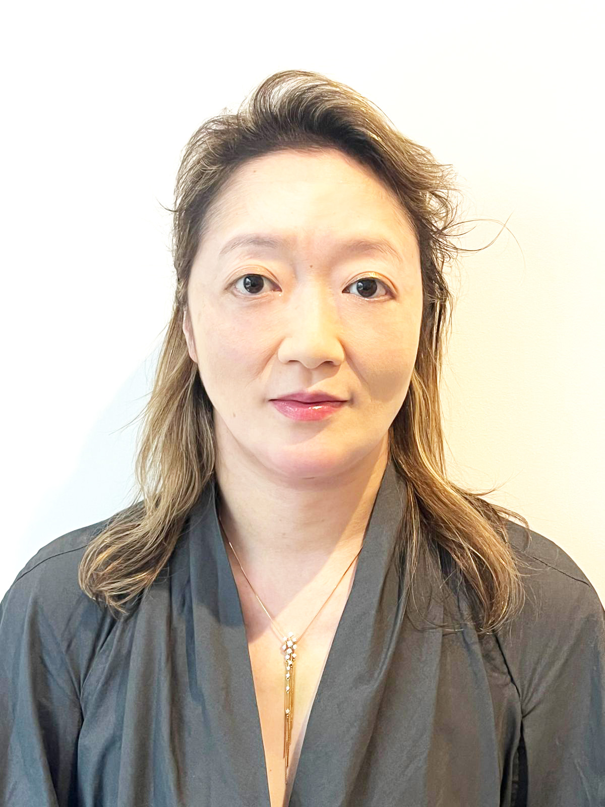 Yukiko Rostein — Receptionist and Trainee Dental Nurse at Bloom Dental Studio London